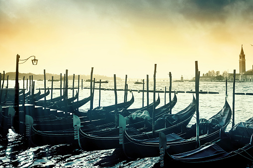 Gondolas on the Venetian Lagoon  in Venice at sunrise