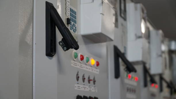 istock industrial electrical panel. Electrical Room in a manufacturing factory industry. Electric wires, cabinets, servers. 1844732446