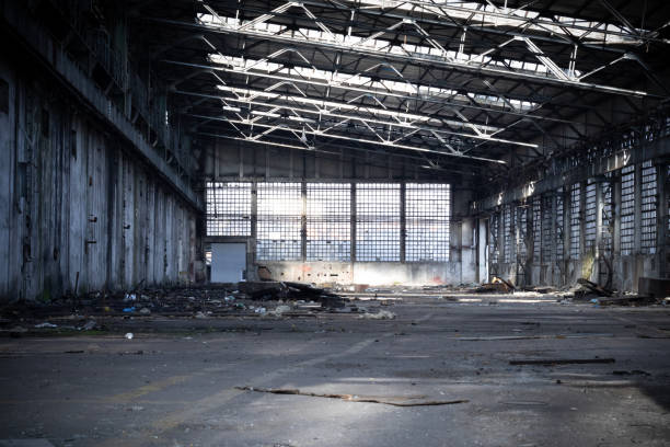 istock Rustic old industrial hangar interior on a sunny day 1844787006