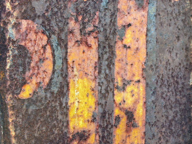 istock Abstract rusted grunge metal surface with white yellow paint 1844817786