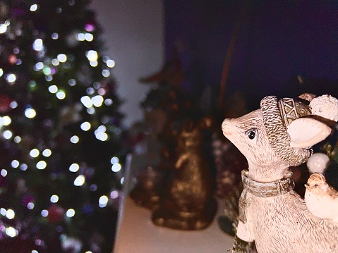 Christmas decoration with Christmas tree lights in the background