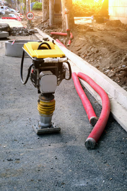 istock A manual pneumatic thrombus machine stands on the road. Vertical image. 1844842792
