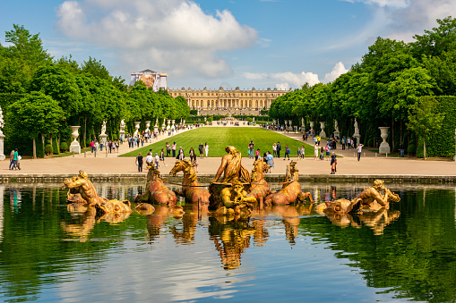 Paris, France - 1983: A vintage 1980's Fujifilm negative film scan of the grounds of the Palace of Versailles, the former royal residence built by King Louis XIV, outside of Paris, France.