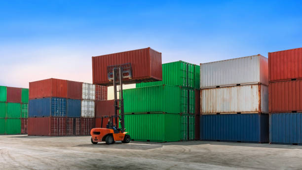 istock Container stacking cargo with forklift truck working in shipping harbor 1844915828