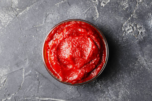 istock Tomato sauce in a bowl on a dark background 1844956081