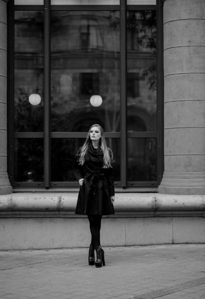 istock woman posing in autumn coat 1844966151