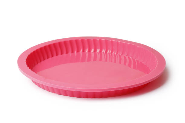 istock silicone mold for baking on a white background. Culinary accessories of the baker. Small baking cups. It is isolated. 1844984902
