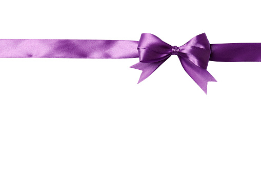 Lilac bow and ribbon on a white background