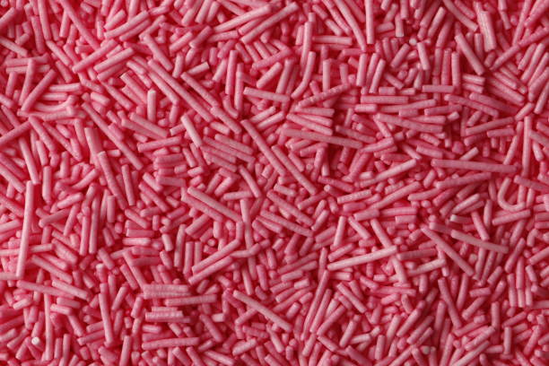 istock Sugar sprinkle dots, decoration for cake and bakery, a lot of sprinkles as a background. Easter holiday. Birthday celebration. 1845014690