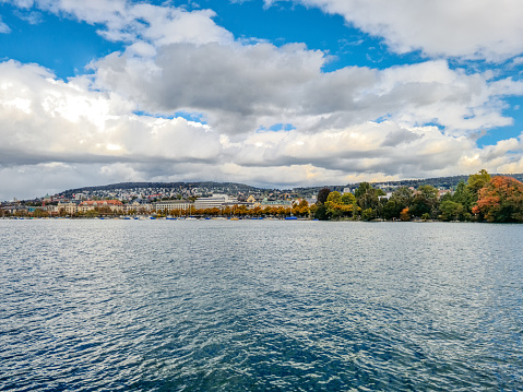 View of Lake Zurich and cityscape from a tour boat in Switzerland.