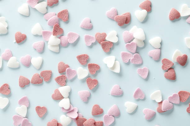 istock Decorative hearts on a blue background. Valentine's day decor concept. February 14 1845063220