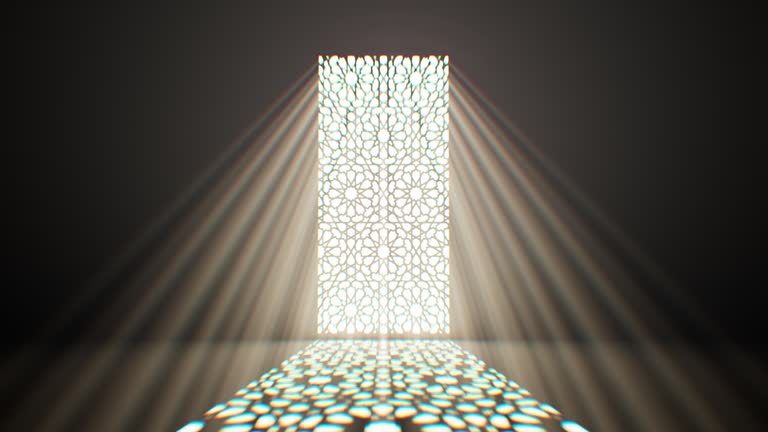 Soft light filters onto the floor from a window featuring delicate floral patterns.