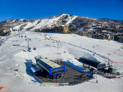 Steamboat, Colorado, USA- December6, 2023:  Morning view looking down from above at lifts and the base of Steamboat ski resort.