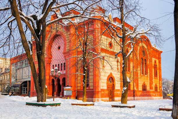 istock red building of a former synagogue among leafless trees 1845154650