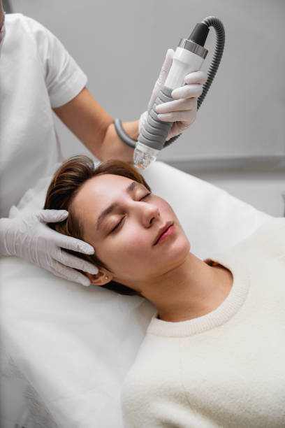 istock A cosmetologist performs hydropiling in a beauty salon. Skin care. 1845162954