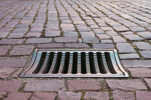 street grate for draining rainwater in the city of Kaysersberg France