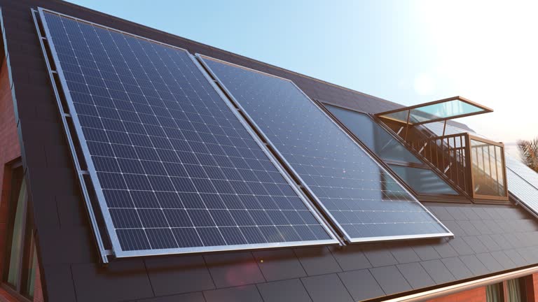 Solar panels on roof. Beautiful modern house and solar energy. Sunny day