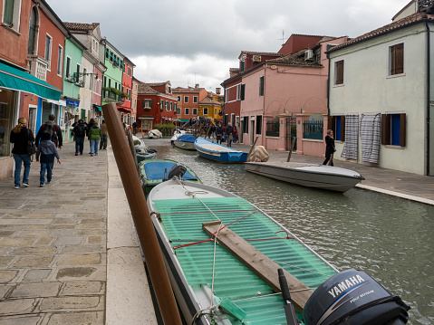 Burano, Italy - November 3 2023: Fondamente S. Mauro street. Burano is an island in the Venetian Lagoon, northern Italy, near Torcello