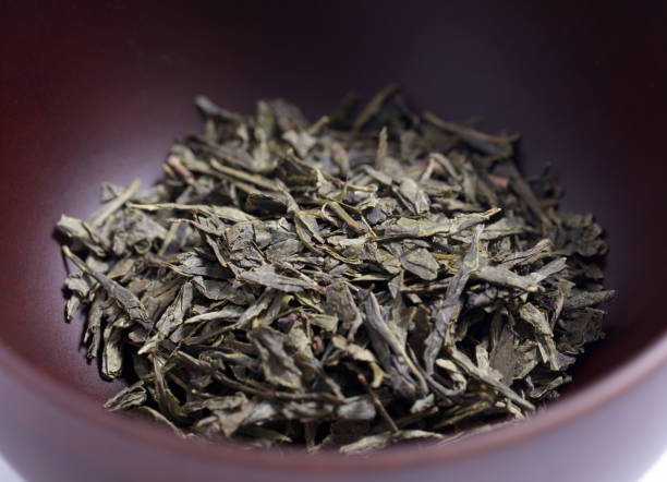 istock Green tea dried and rolled leaves 1845313161