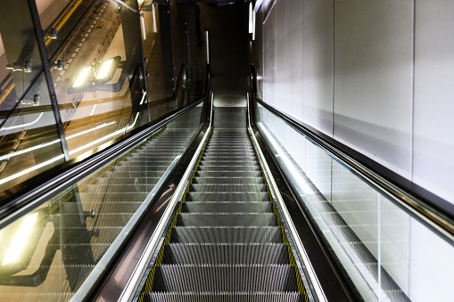 This is a photograph of a descending escalator in Amsterday.