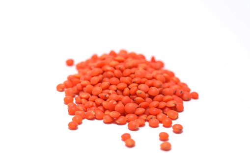 Red lentils isolated on white background