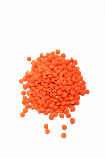 Red lentils isolated on white background
