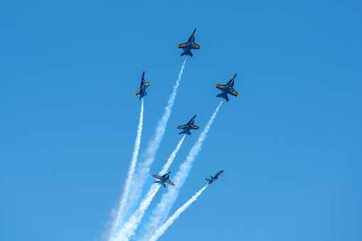 Airplane in sky performing trick. Photo Taken at the Point Mugu Airshow on 3/17/23 in Ventura County California.