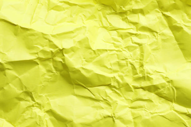 istock Crumpled yellow paper as background 1845400566