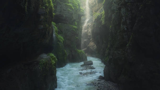 istock a river runs through a narrow canyon on the side of a mountain 1845401077