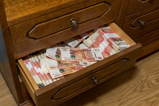 Savings in Russian rubles of five thousand each, stored in an old closet. A large amount of money in cash.