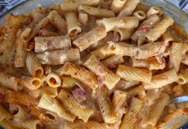 baked pasta with ham in bechamel sauce