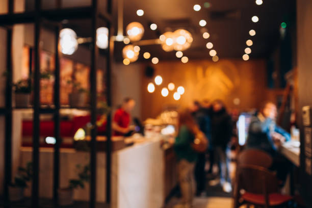 Abstract blur defocus coffee shop cafe or restaurant interior background. Blurred cafe restaurant with bokeh background Abstract blur defocus coffee shop cafe or restaurant interior background open space bar stock pictures, royalty-free photos & images