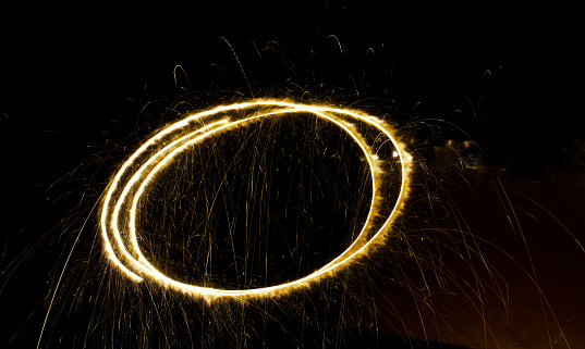 Fireworks in long exposure with black background.
