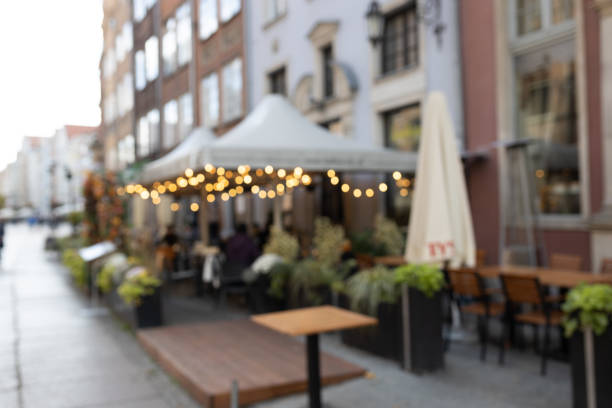 istock Blurred image of the terrace interior with garland lights, warm light source. Abstract image 1845450523