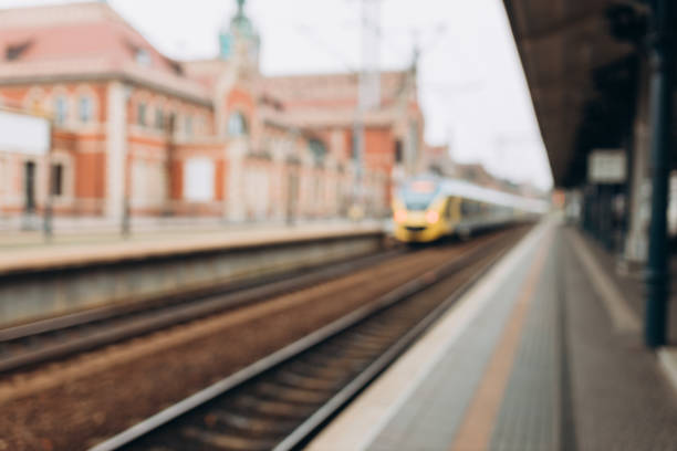 Blurred background of empty train station. Blurred scenery of the platform