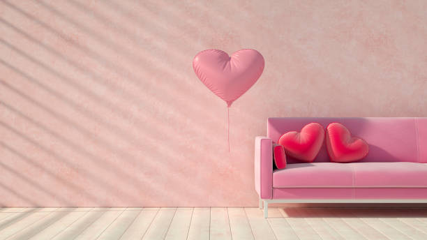Valentine's Day concept with pink sofa and heart pillows