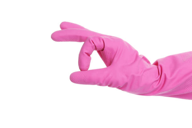Thumb up symbol in rubber glove. pink glove ok insulation. isoled. Thumb up symbol in rubber glove. pink glove ok insulation. isoled. pollex stock pictures, royalty-free photos & images