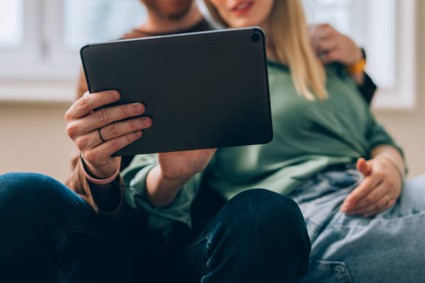 istock Boxes & Clicks: Happy Couple Styles Their New Haven Online 1845489118