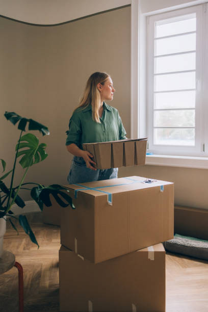 istock New Beginnings: Woman Moving In 1845490128