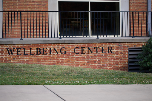 Wellbeing Center sign on building wall