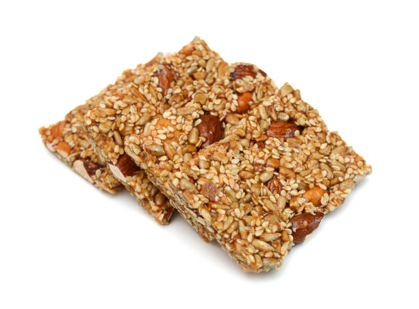 istock Honey bars with peanuts, sesame and sunflower seeds isolated 1845493854