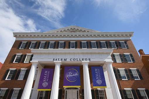 Winston-Salem, North Carolina - October 27, 2023: Salem College sign over education building on campus in Winston-Salem, North Carolina.