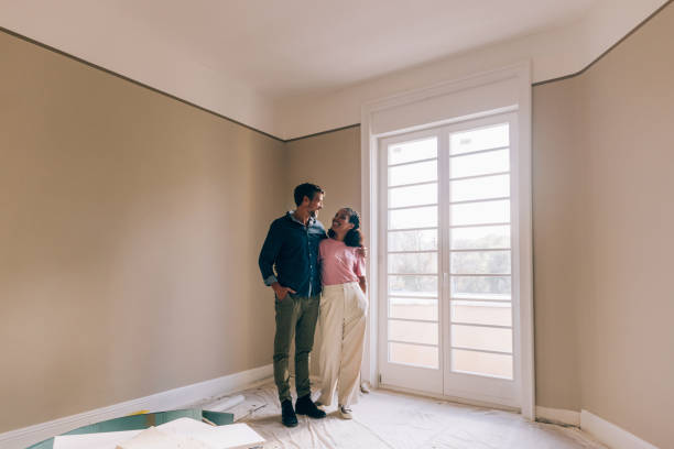 istock Empty Canvas: Couple Planning in New Home 1845514681