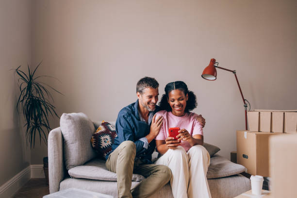 istock New Investments: Couple Trading Online While Moving In 1845515785
