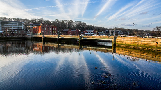 Westport CT, USA - December 9, 2023:  Beautiful afternoon with bridge reflections on Saugatuck river