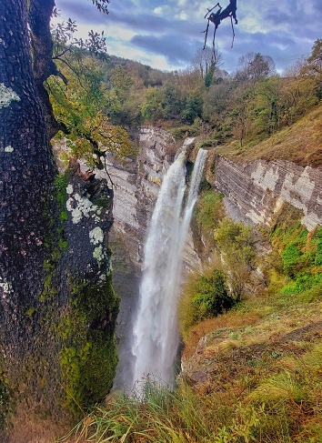 Cascada de Gujuli (Basque: Goiuriko ur-jauzia) is a waterfall with a vertical drop of over 100 m (330 ft) near the village of Gujuli, in the municipality of Urkabustaiz, Álava province, Spain