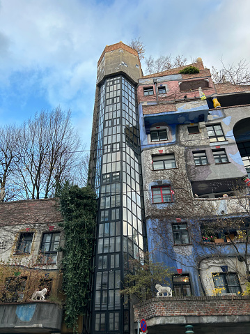 Hundertwasserhaus on Vienna street, capital of Austria - very nice photo with lot of details. It is editorial photo and it is showing details from Vienna, Austria.