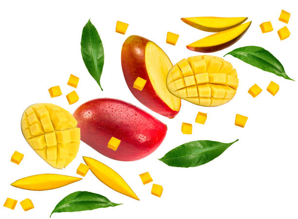 istock flying sliced fresh mango with green leaves isolated on white background. exotic fruit. clipping path 1845644784