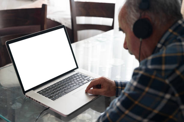 istock Photo of senior man using laptop 1845679529