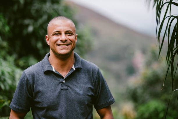 istock Smiling man standing outside on a his patio with a scenic view 1845684221